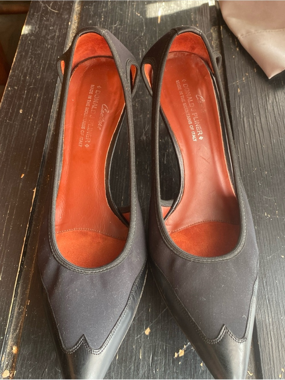 Donald J. Pliner Black Pointed Toe Pumps with Red-Orange Insole